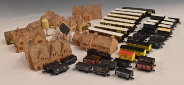 Forty mainly Peco N gauge model railway locomotives, coaches and wagons together with a collection