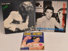 Two signed LPs comprising Peter Sarstedt 'Update' and Marty Wilde 'Born to Rock and Roll' together