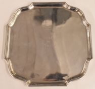 Hallmarked silver shaped tray or salver raised on four ball feet with engraving to TH Somervell,