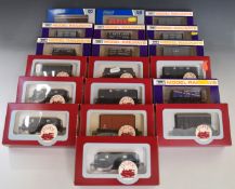Nineteen Dapol 00 gauge model railway wagons including Bristol and Cheltenham examples, all in
