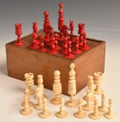 A 19thC stained ivory chess set, height of king 9.2cm