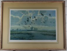Peter Scott signed print 'Pink Feet in the Green Marshes' 39cm x 56cm, in limed wood frame, with