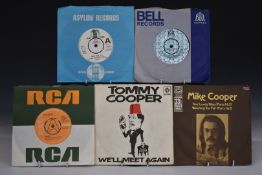 Approximately 300 singles including Ry Cooder, Peter Cook, Alice Cooper, Tommy Cooper, Julian
