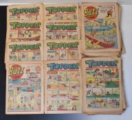 Over seventy issues of Buzz and Topper Comics