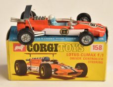 Corgi Toys diecast model Lotus Climax F/1 with two-tone orange and white body and racing number 8