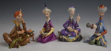 A set of four Herend seated Eastern figures, all boxed, three with certificates