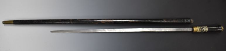 Swordstick with inlaid bone handle, brass lion head pommel and India to 59cm blade. PLEASE NOTE