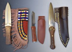 Thee modern knives including a beaver tail dagger with leather sheath, blade length 18cm, a