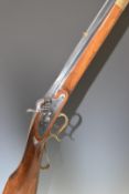 Italian .50 smooth bore percussion hammer action Kentucky style rifle with brass scrolling spurred
