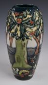 Moorcroft ovoid vase decorated with holly trees and berries, dated 1997, H19cm
