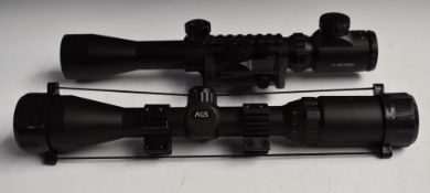 Two rifle scopes one 3-9x40EG with scope mounts and rail the other AGS 3-9x40 MD2 Mil-Dot Adj with