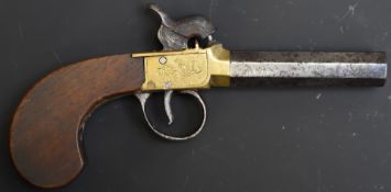 Unnamed percussion hammer action pocket pistol with engraved brass lock, engraved stylised dolphin
