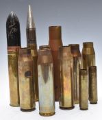 WW2 2 pounder shell dated 1943 together with two 20mm brass cases dated 1942, seven 30mm shell cases