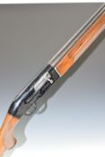 Beretta A301 12 bore three-shot semi-automatic shotgun with engraved locks, chequered semi-pistol