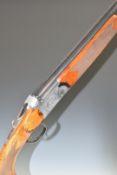 Italian 12 bore over and under ejector shotgun with engraved locks, trigger guard, underside and top