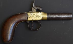 Percussion hammer action pocket pistol with engraved brass lock, engraved white metal butt cap,