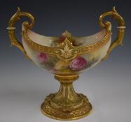 Royal Worcester twin handled pedestal vase decorated with roses and signed M Leaman, shape no 194,