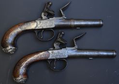A pair of Adams of London Queen Anne flintlock pocket pistols with named and engraved locks,