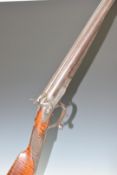S&C Smith 12 bore side by side hammer action shotgun with grip safety, named and engraved locks,
