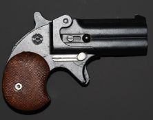 Italian .36 blank firing over and under Derringer pistol with chequered grips, sheath trigger and