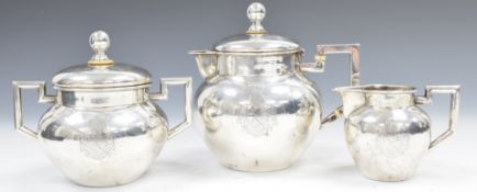 German white metal three piece bachelor's tea set comprising teapot, sugar bowl and lid and milk