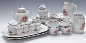 Approximately fifty seven pieces of Wedgwood tea and dinner ware decorated in the Flying Cloud