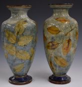 Pair of Royal Doulton Foliage Ware pedestal vases decorated in the Autumn Leaves pattern, one