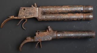 Two unnamed double barreled pistol actions and barrels, one side by side (16.5cm long) the other