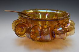 Carnival glass punch bowl, cups and associated ladle, H18, diameter 31cm