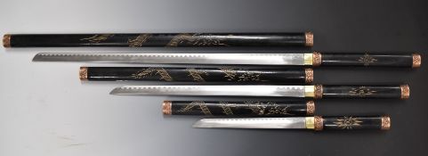 Graduated set of three replica Samurai swords, longest blade 66cm. PLEASE NOTE ALL BLADED ITEMS