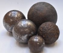 Five cannon balls of various sizes, heaviest 12lb