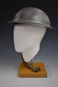 WW2 British 'Brodie' steel helmet stamped HMB 1941 with liner and chin strap together with one other