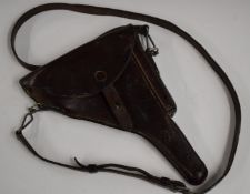 German leather revolver or pistol holster with magazine compartment and shoulder sling, stamped to