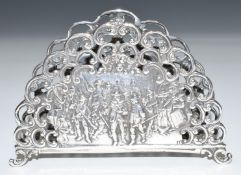 Late 19thC continental silver letter rack, each side with repoussé decoration depicting Rembrandt'