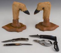 Taxidermy hoof gun rack and knives.
