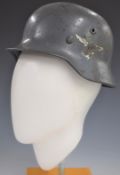 WW2 German Luftwaffe single decal steel helmet, with eagle stamp and initials FL and D7 to leather