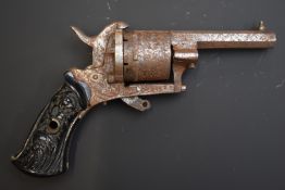 Unnamed 7mm six-shot double action pin-fire revolver with engraved cylinder, carved grips and 2.5