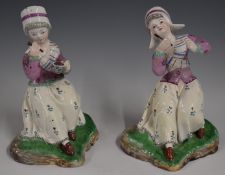 19thC pair of hollow based figures of girls drinking hot chocolate, H12cm