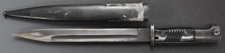 Mauser bayonet with flashguard and ribbed grips, 26cm fullered blade and scabbard. PLEASE NOTE ALL