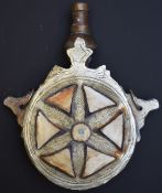 Arabic or eastern powder flask with embossed and engraved decoration and inset bone panels, 16.5cm