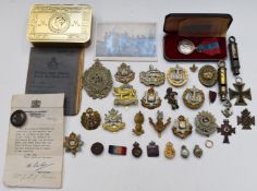 Small collection of badges and militaria including Gloucestershire Regiment, R.E.M.E, Argyll &