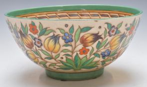 Bursley Ware Charlotte Rhead large bowl with tube line decoration of flowers, geometric design to
