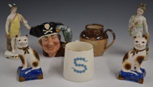 Two 19thC porcelain figures, a pair of Staffordshire cats, Dresden, Royal Doulton, Goss mug etc