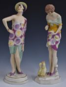 Pair of Royal Dux figurines in flamboyant dress, one in Art Deco style, one feeding ducklings,