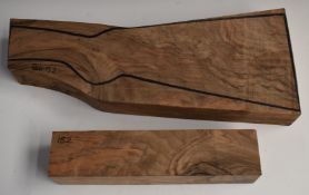 A matching set of figured walnut stock and forend blanks, stock 45cm long, forend 29.5cm long.
