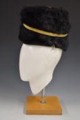 British Army WW1 Royal Gloucestershire Hussars fur busby retaining yellow cord line and scarlet bag,