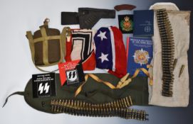 Collection of militaria including link ammunition, WW2 style water bottle, canvas pistol holster,