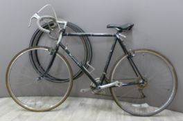 Raleigh touring or racing bicycle with Reynolds 531 frame and Shimano derailleurs and levers,