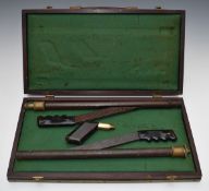 Two vintage air rifle pumps in brass bound wooden box.
