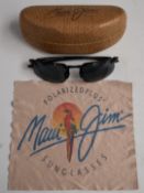 A pair of Maui Jim designer sunglasses in case